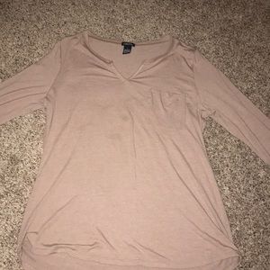 Tannish pink shirt